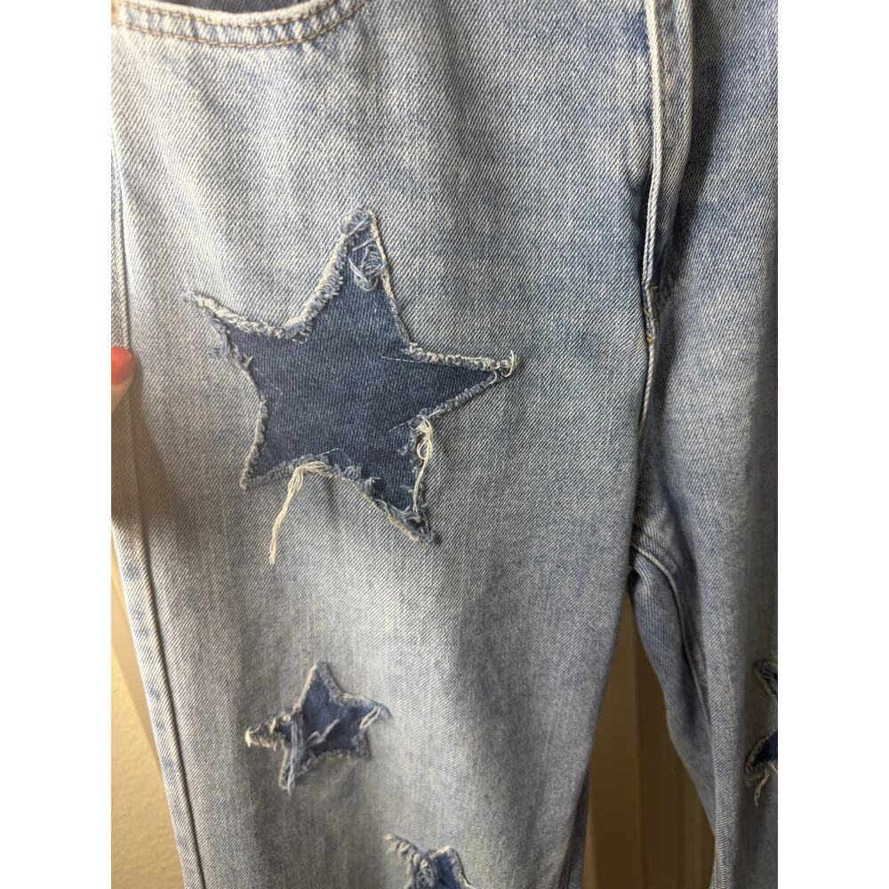 high-rise straight leg jeans with denim star patches distressed light wash. - Picture 3 of 6